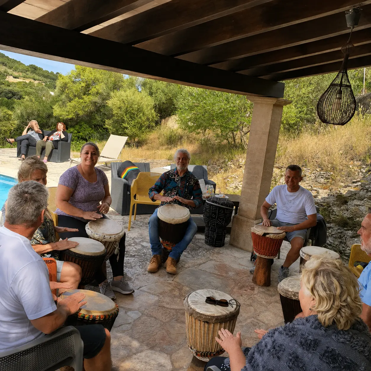 A drum circle by the pool under the pergola